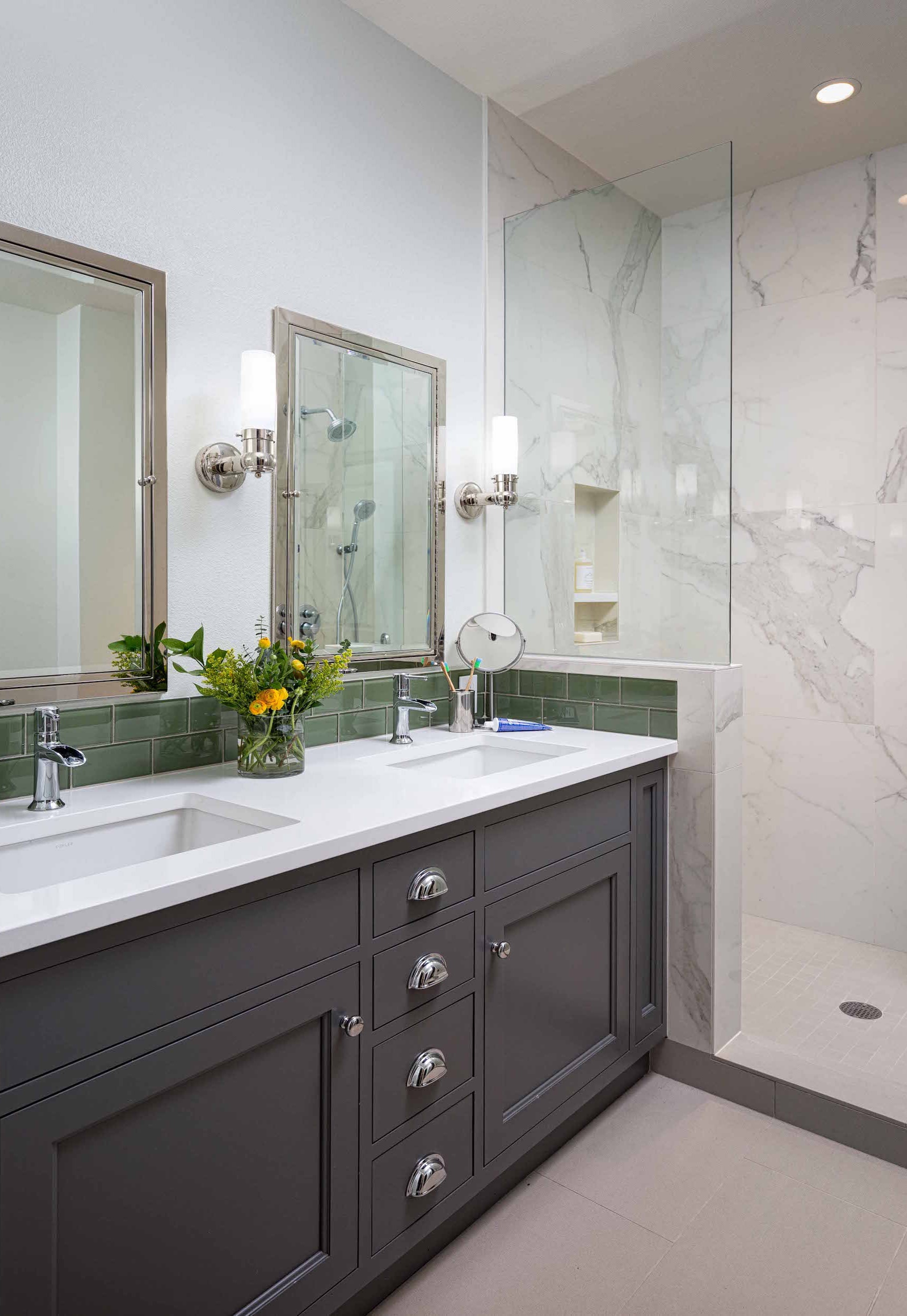 The beautiful bathroom sink, featuring 2 beautiful clear mirrors.