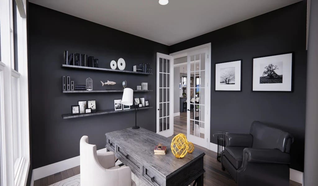 The home office has leather armchairs, a rustic wooden desk, and matching shelves fixed against the gray walls.