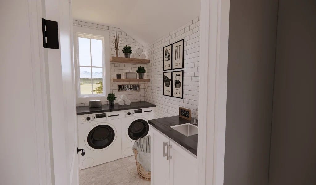 A white-framed window brings natural light into the laundry room.