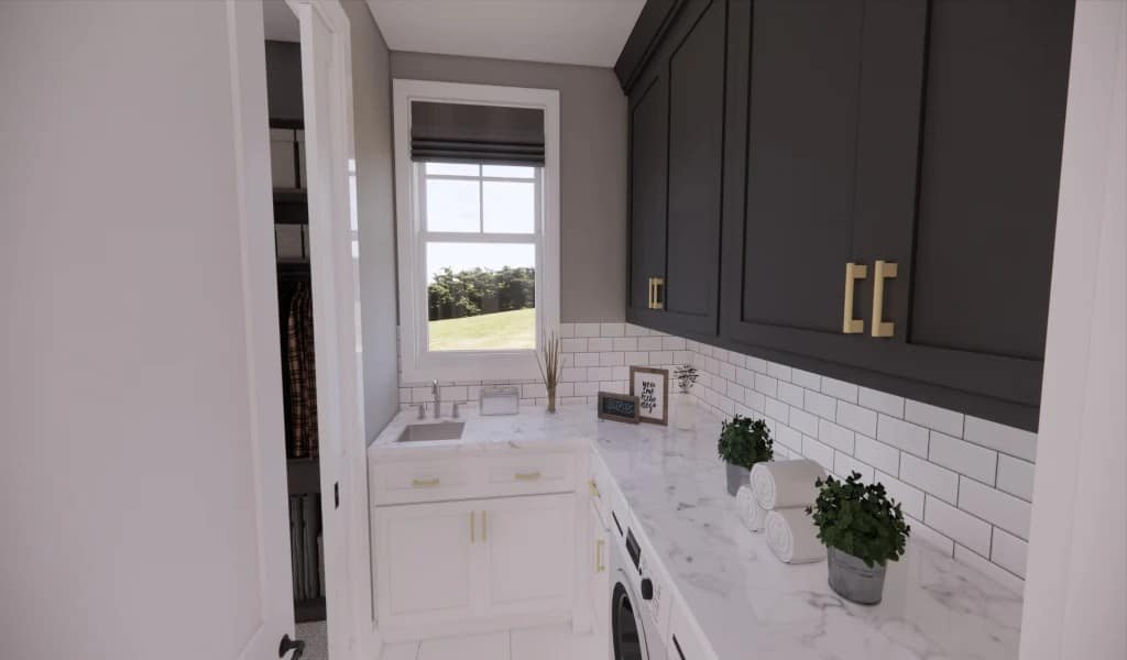 The laundry room features contrasting cabinets, marble countertops, and a utility sink.