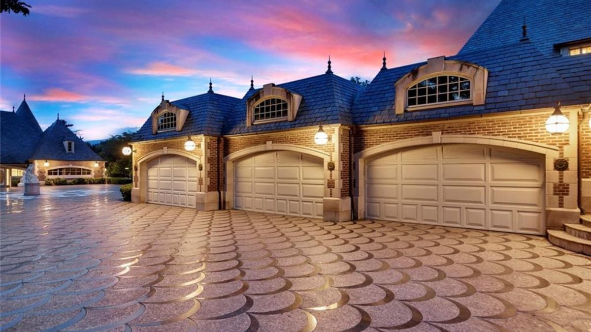 Garage with hydraulic car lifts.