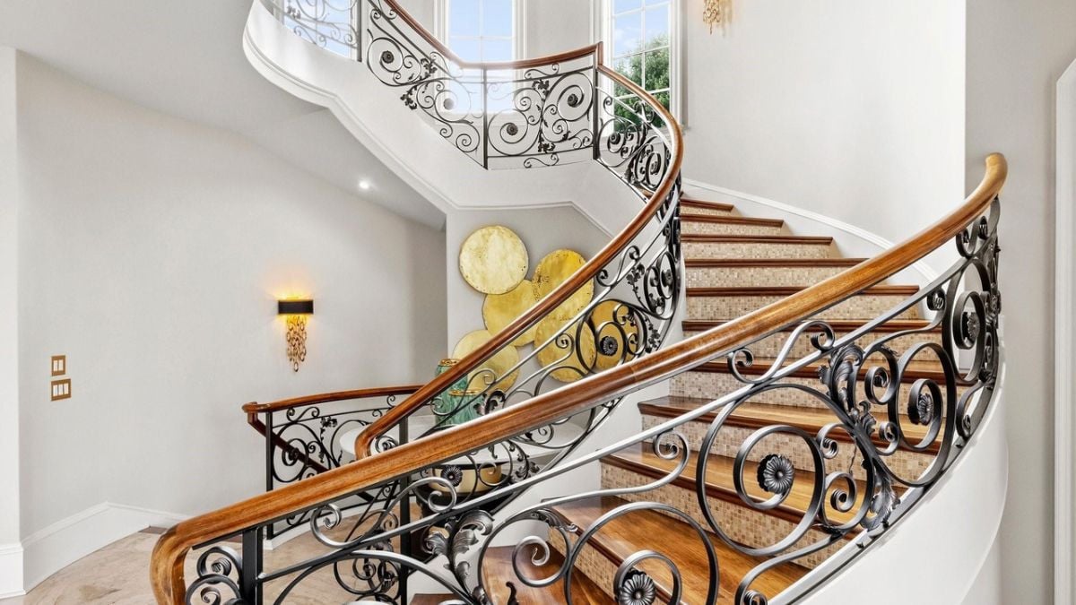Wooden stairs and decorated handrails