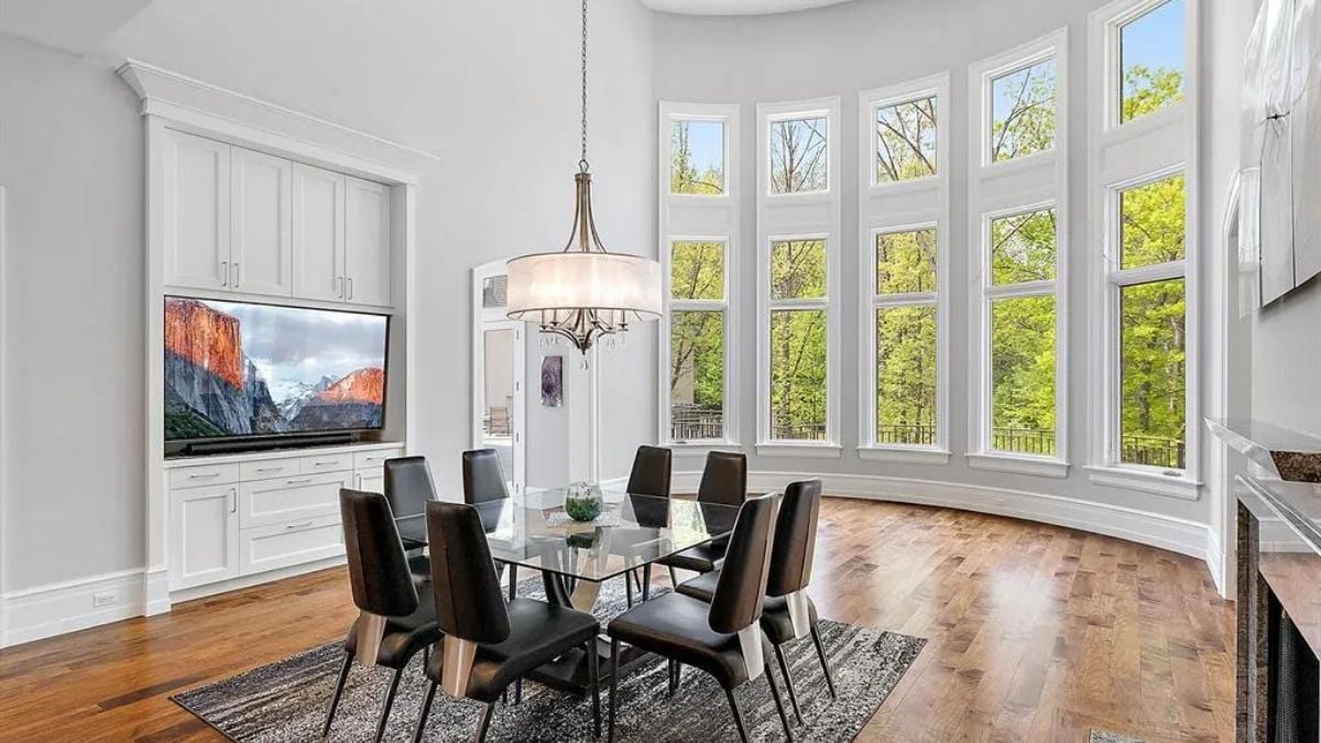 Dining area with modrnized chandelier