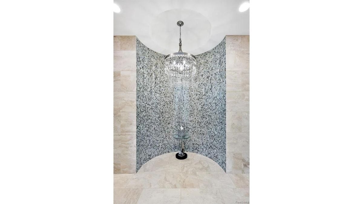 Modern chandelier and mosaic tiles