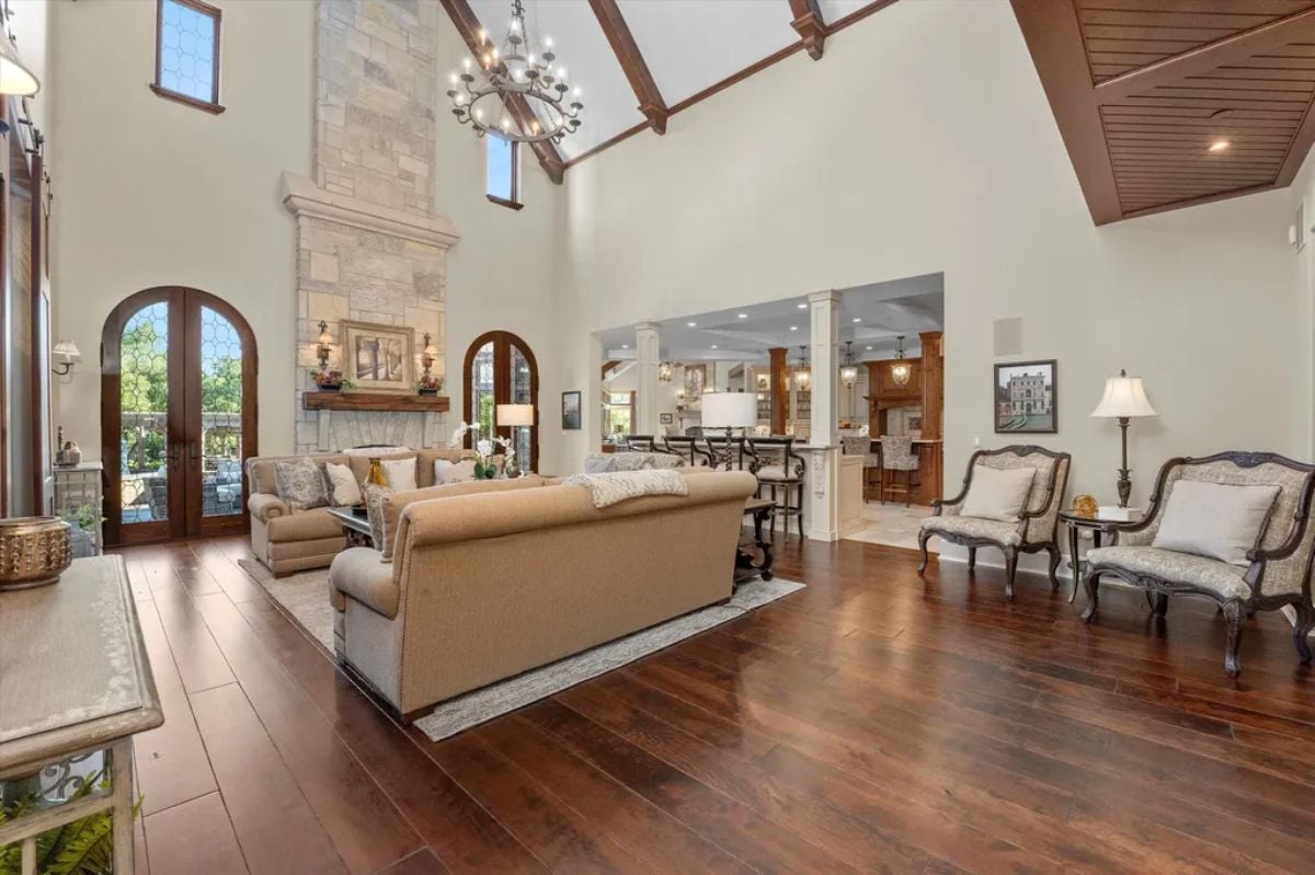 Spacious living room with arch style doors
