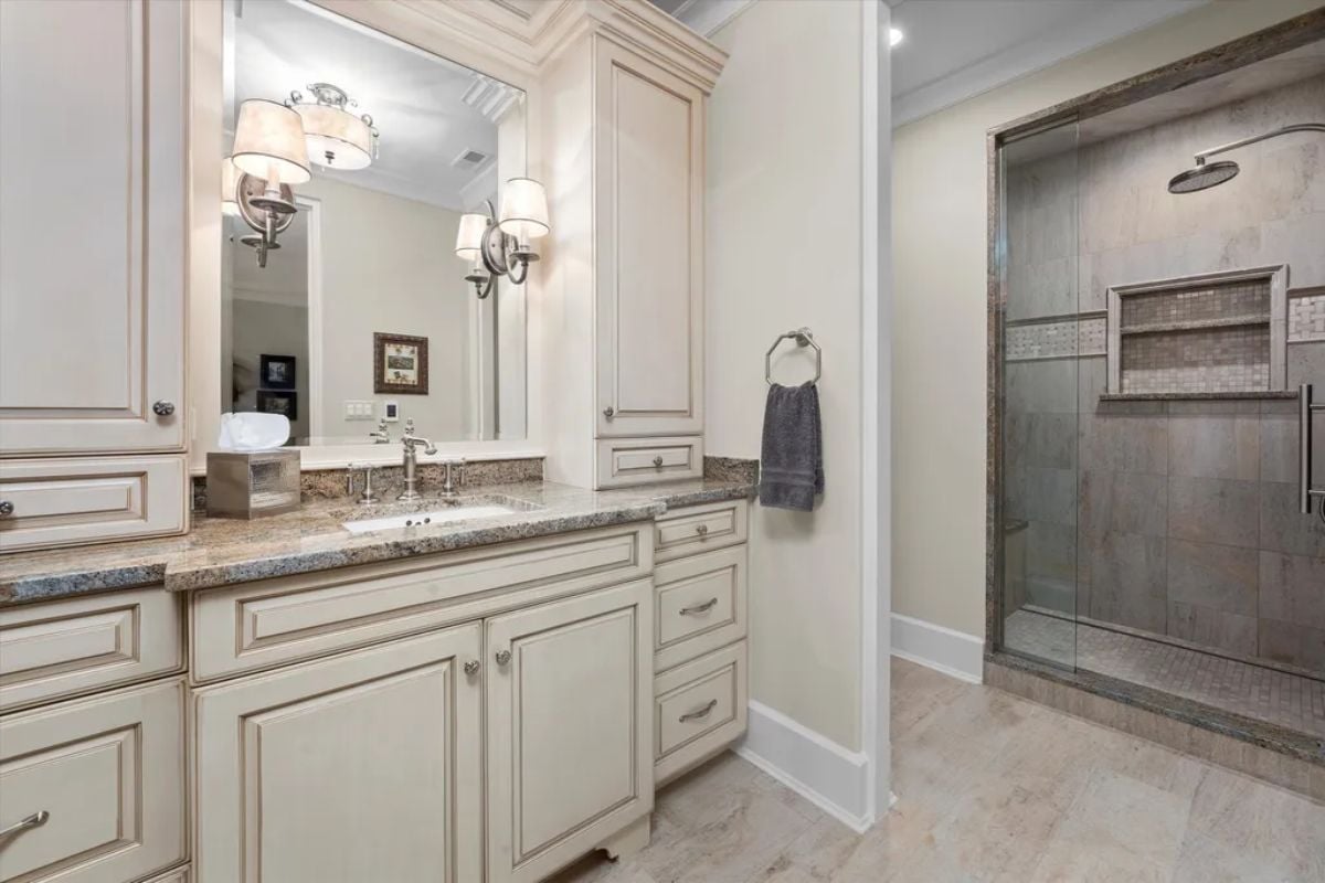 White compartmentalized bathroom cabinet