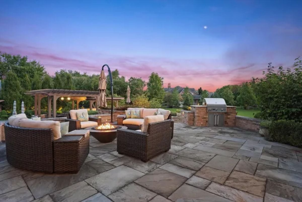 Outdoor fireplace with umbrella