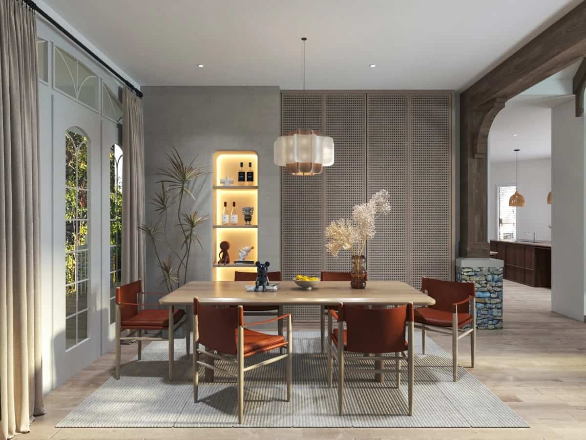 Dining room with a contemporary dining set, inset shelves, and outdoor access through a glazed door.