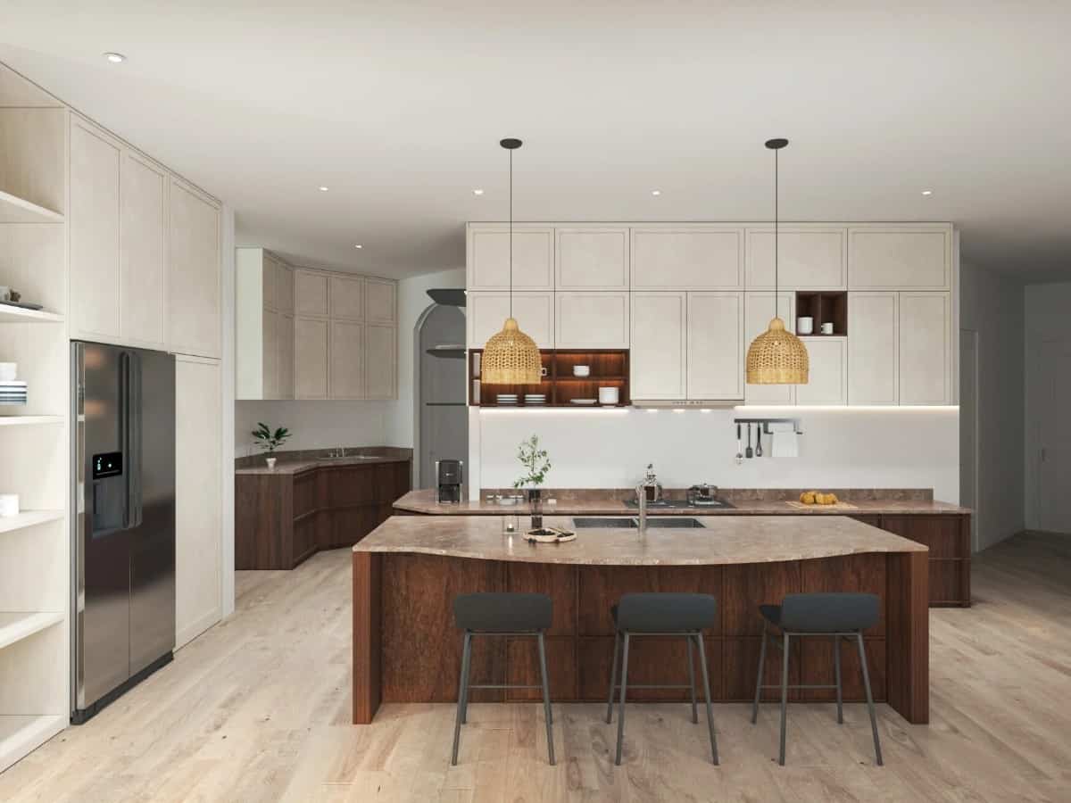 Kitchen with light wood cabinetry, high-end appliances, granite countertops. and a large center island.