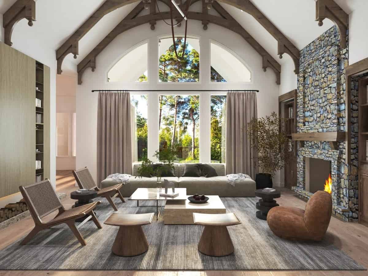 Lodge room with modern seats, a stone fireplace, and a cathedral ceiling framed with exposed trusses.
