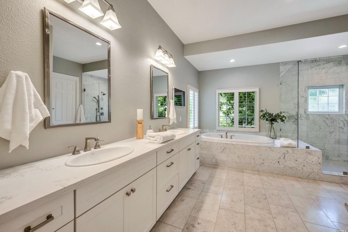 Bathroom with sink and bath tub.