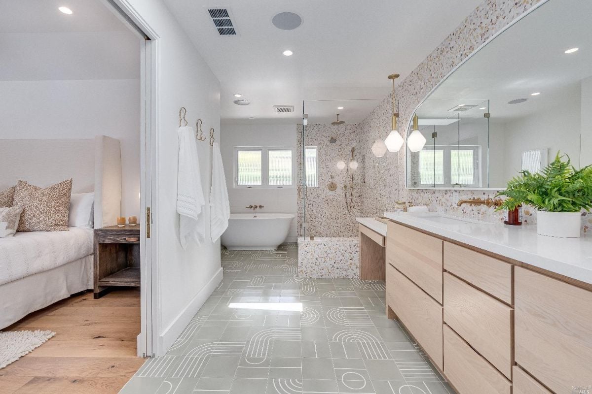 Bathroom with a sink, shower, and bath tub.