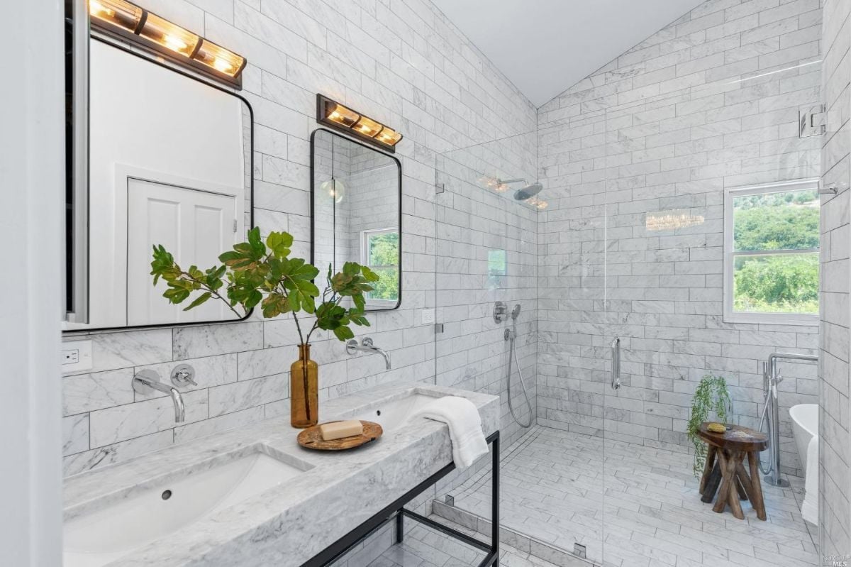 Bathroom with sink and shower.