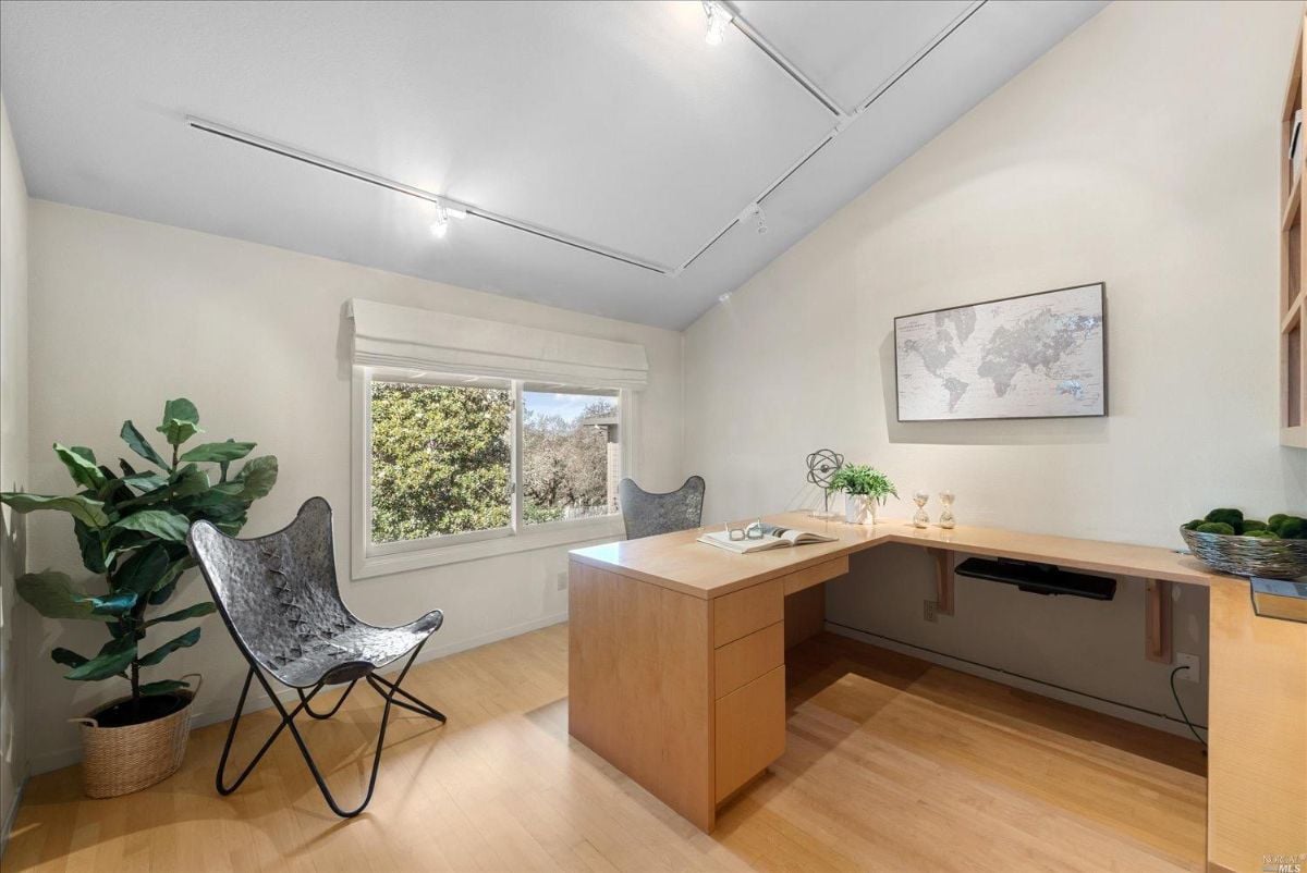 Home office with a desk and chair.