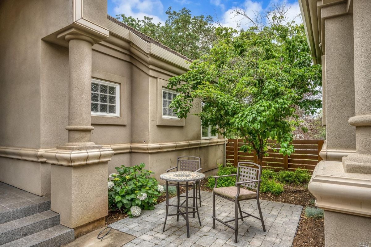 Patio with a table and chairs.