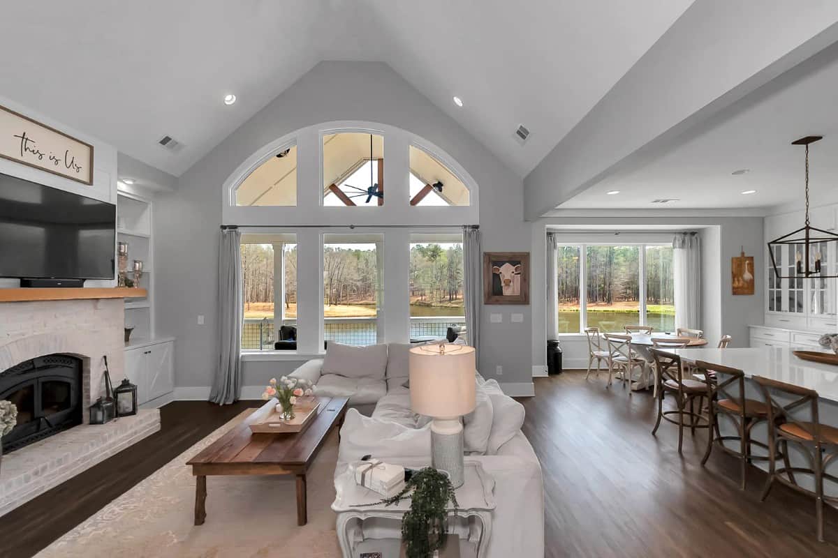 An oversized opening seamlessly connects the family room and eat-in kitchen together.