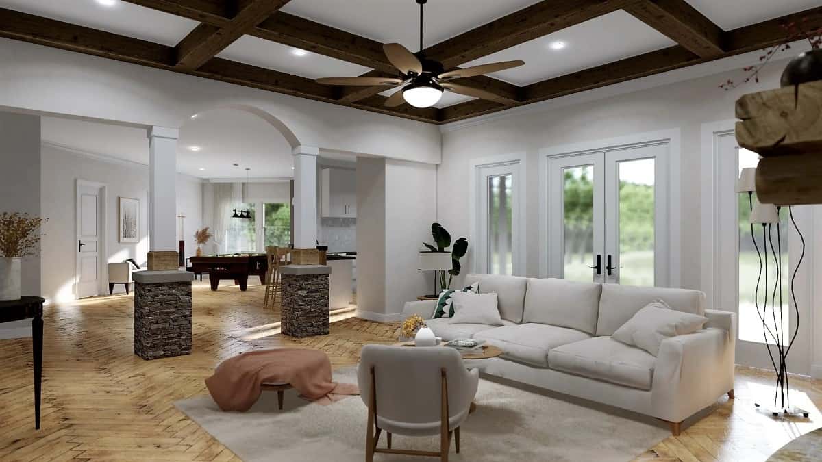 Stone base archways connect the billiards room and social room.