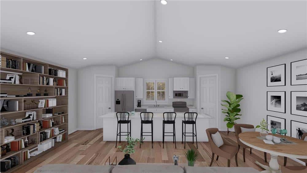 The kitchen offers two pantries, stainless steel appliances, and a center island with seating for four.