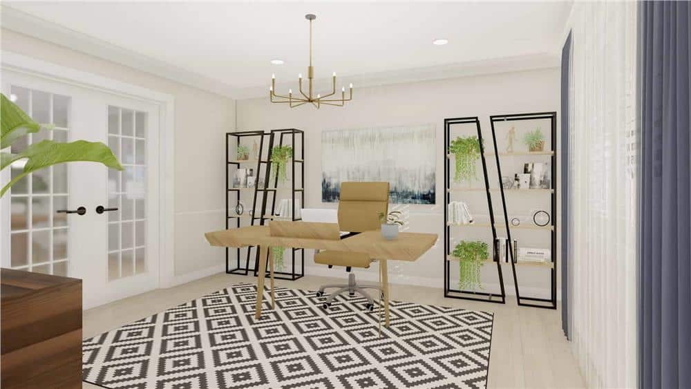 Home office with a French door, metal shelving units, and a wooden desk that sits on a patterned area rug.