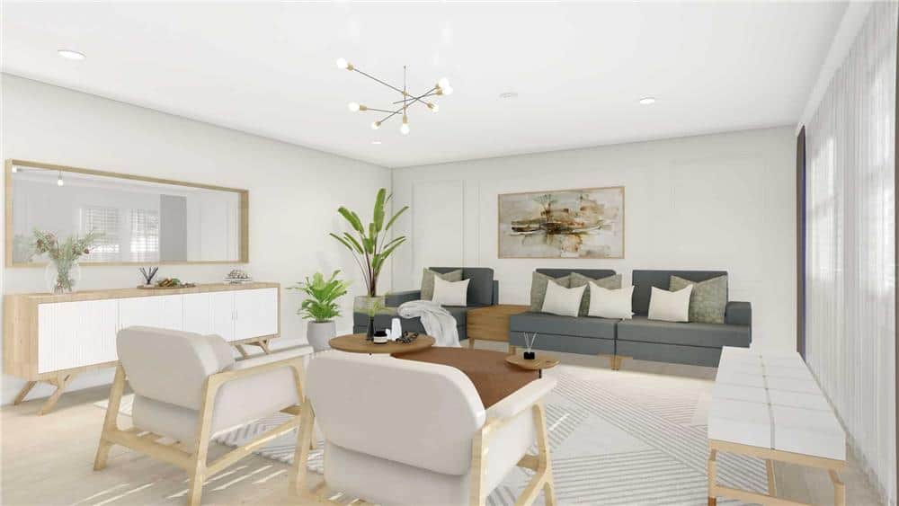 The family room has modern seats and a wooden console table topped with a rectangular mirror.