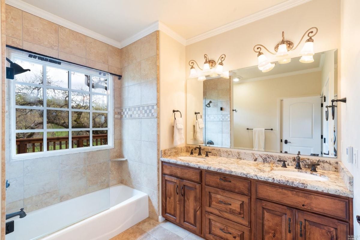 Bathroom with a sink and bath tub.