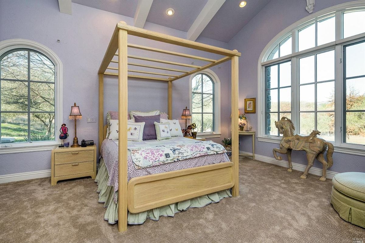 Bedroom with huge windows.