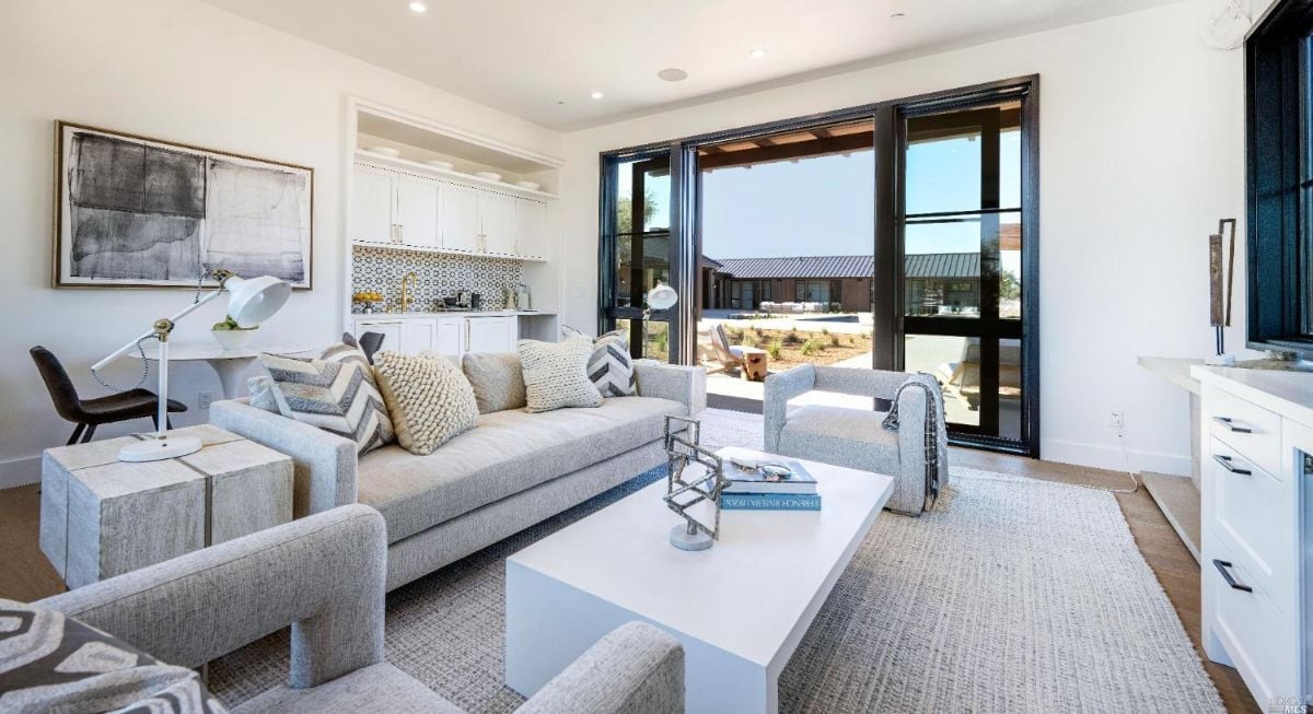 Guest house's living room with couches.