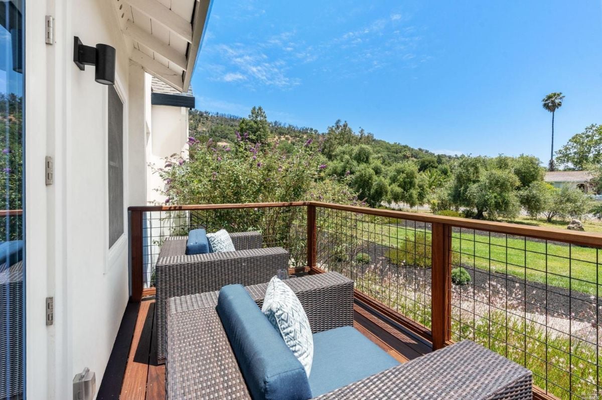 Balcony with chairs.