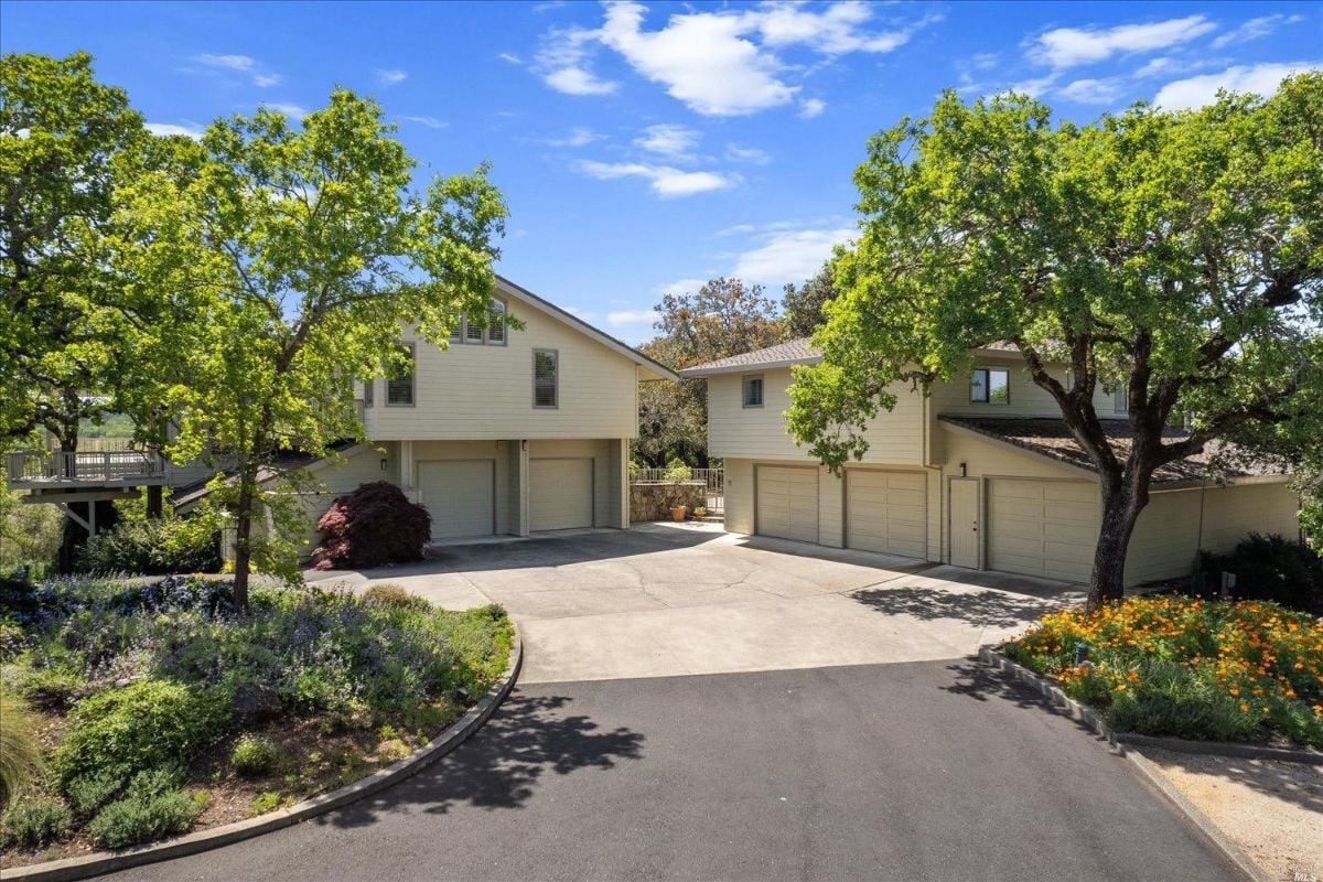 Garage with spacious driveway.