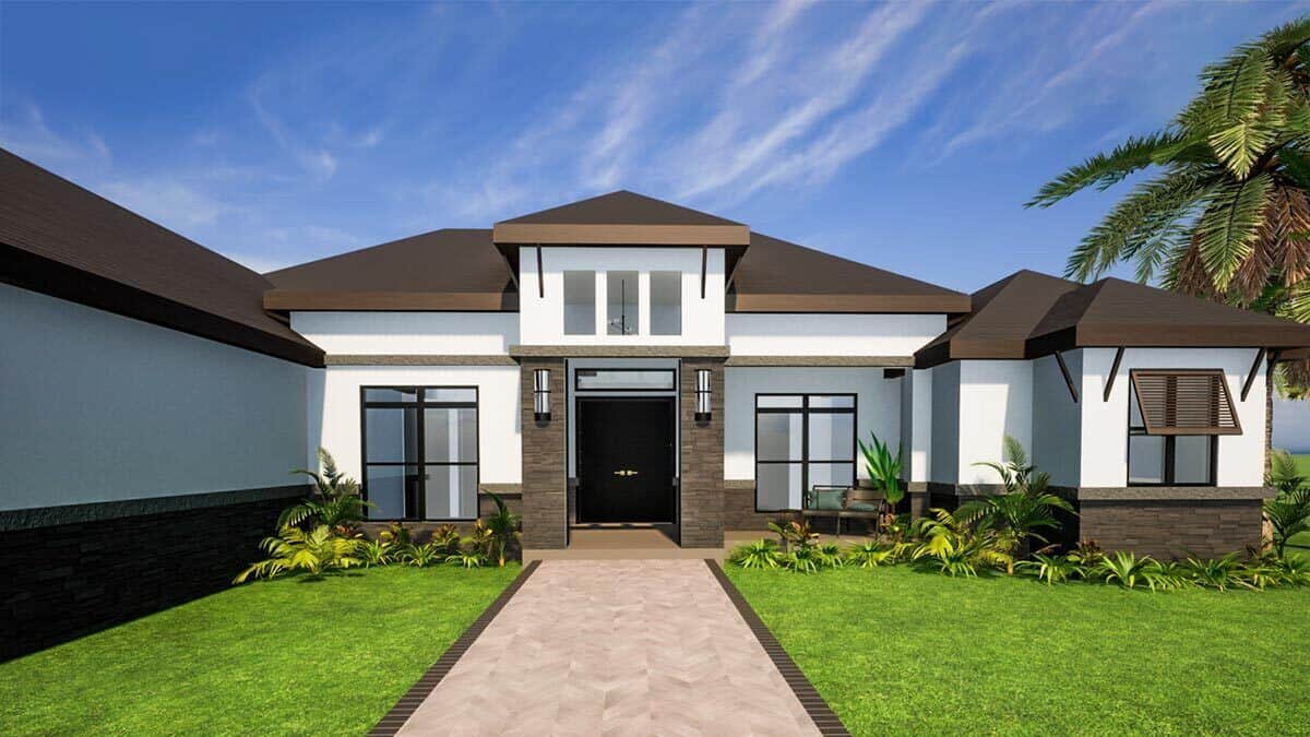 Front porch with huge stone columns, a dormer window above, and aluminum-framed windows.