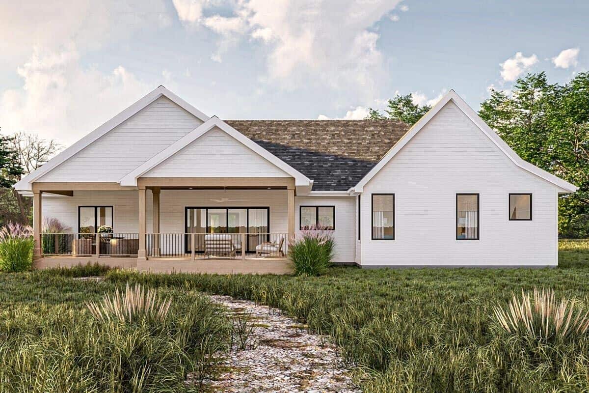 Rear rendering with multiple gables and a covered deck.