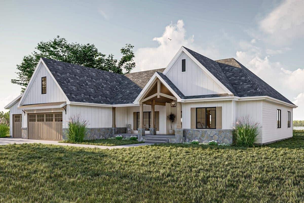 Angled front view of the house showcasing the entry porch and the 3-car front-loading garage.