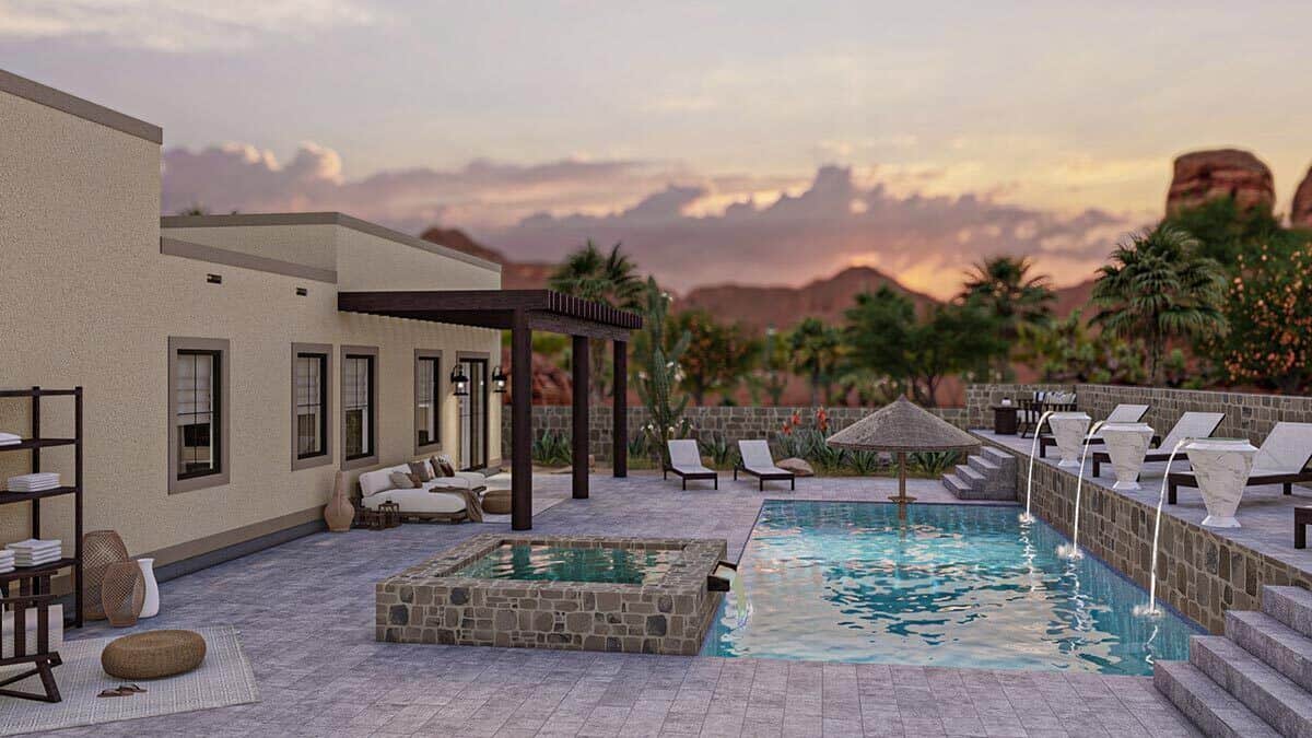Pool terrace with a hot tub, sun loungers, and waterfall features.