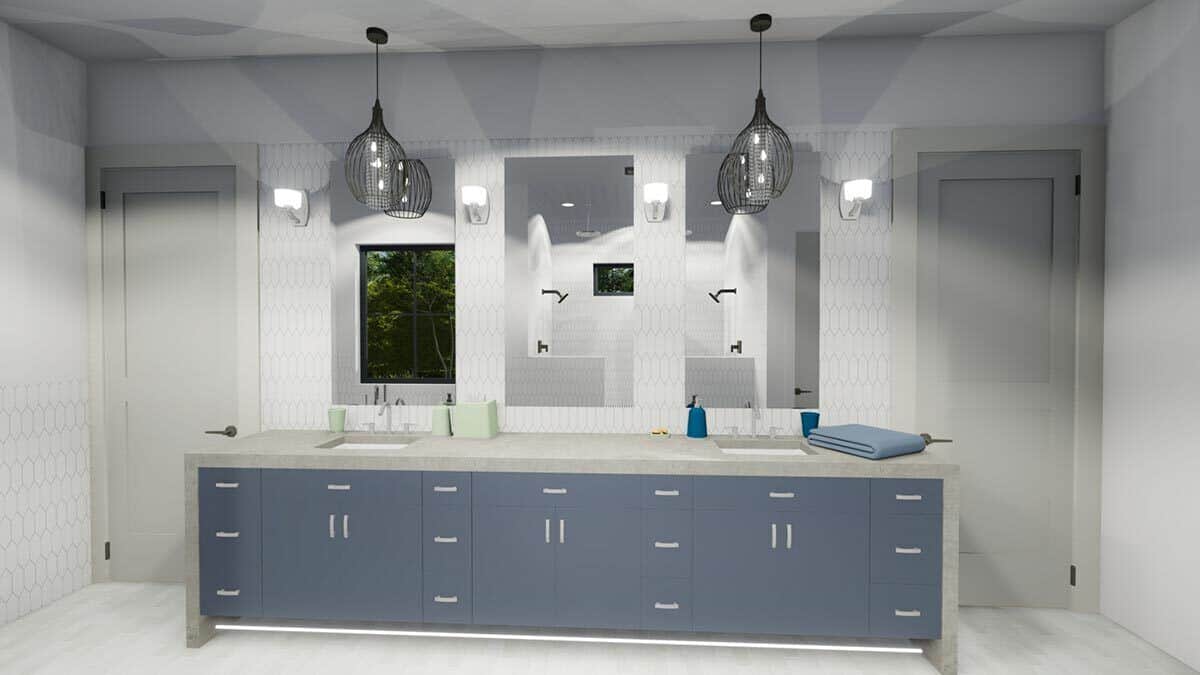 Primary vanity with two sinks, light blue cabinets, and three frameless mirrors.