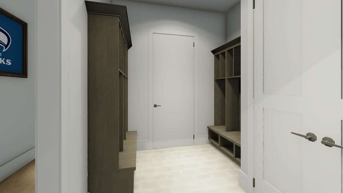 Mudroom with built-in lockers over light hardwood flooring.