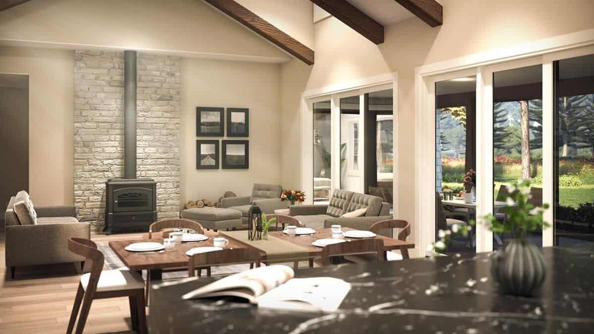 A view of the dining area and great room from the kitchen island.