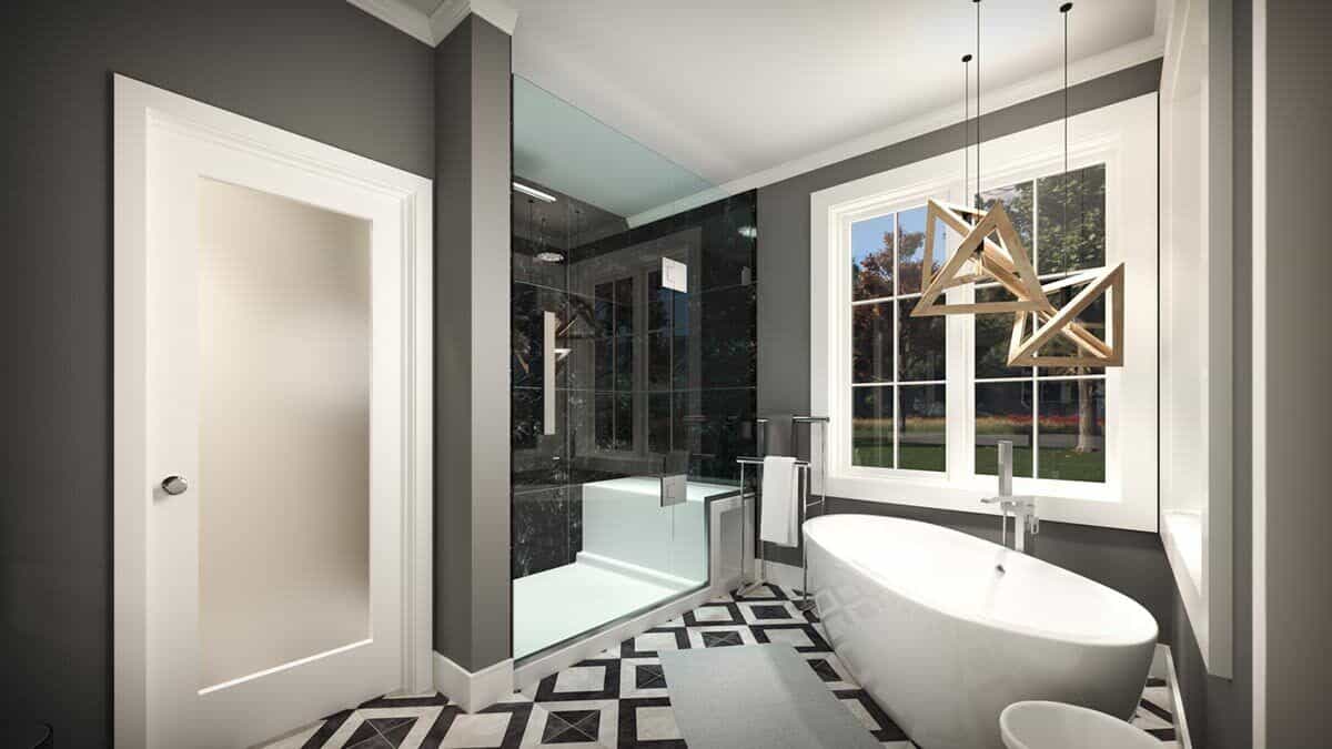 The primary bathroom includes a soaking tub topped with modern pendant lights.