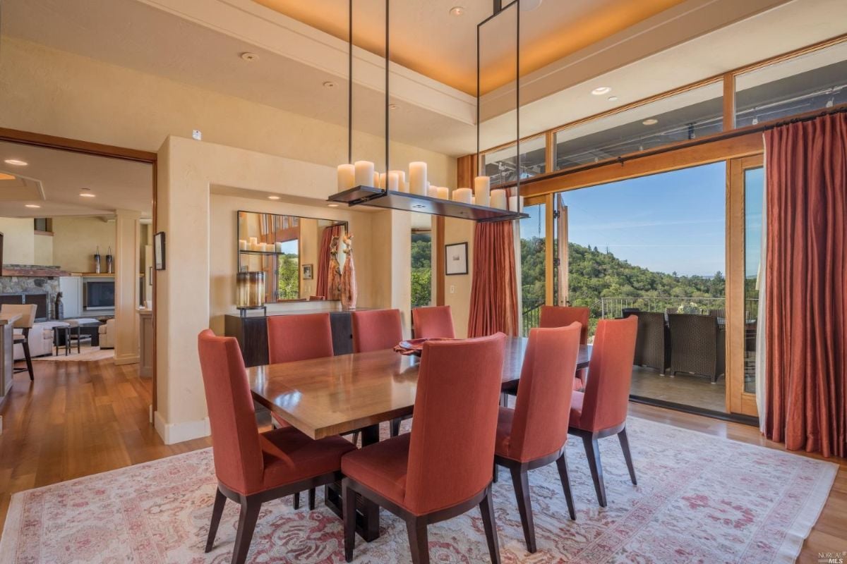 Dining room with a large table and chairs.