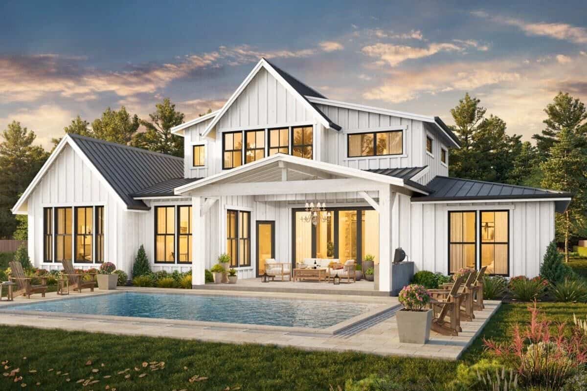 Rear rendering with a covered porch, a pool terrace, and a multitude of windows.