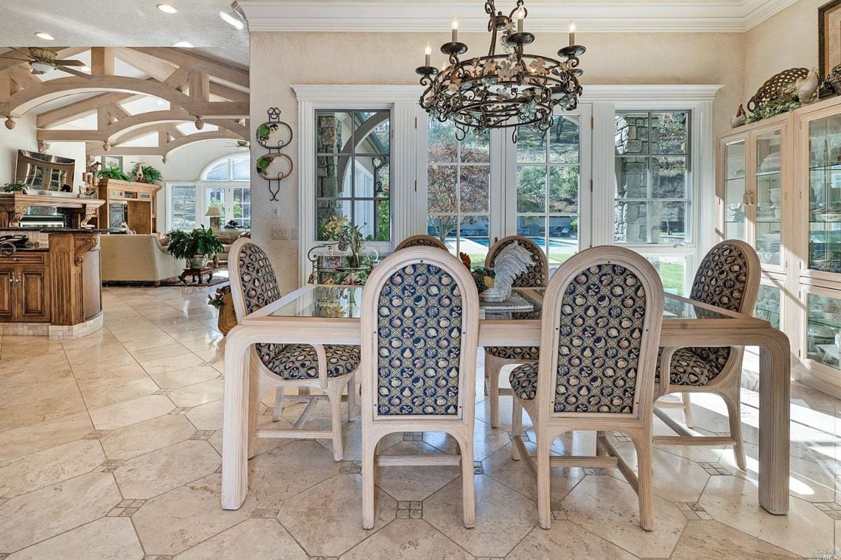 Dining room with a large table and chairs.