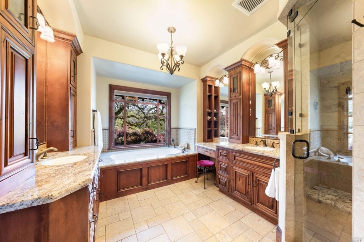 Bathroom with a sink, bath tub, and shower.