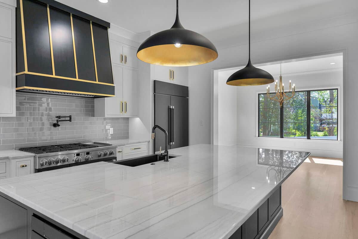 A large opening connects the kitchen to the keeping room.