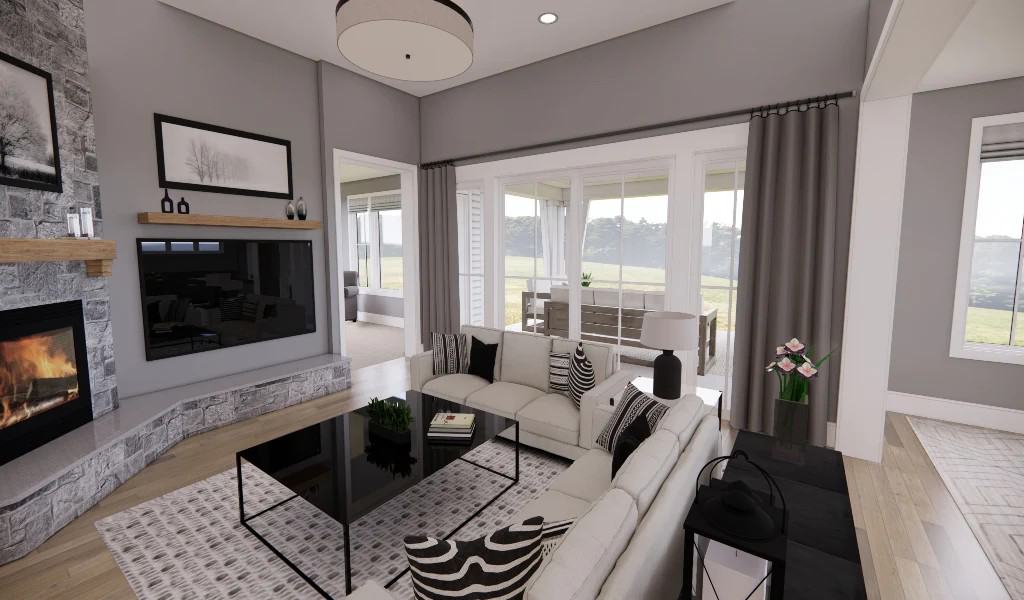 Great room with a corner fireplace, a wall-mounted TV, and gray sectionals paired with a metal coffee table.