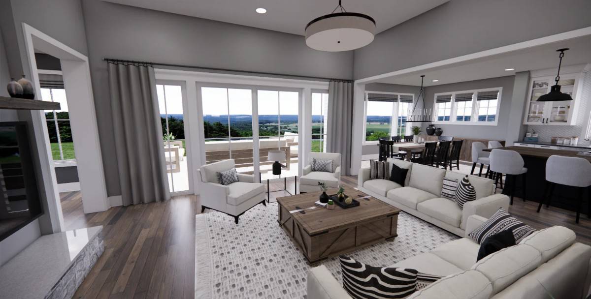 The great room includes direct access to the back porch through sliding glass doors.