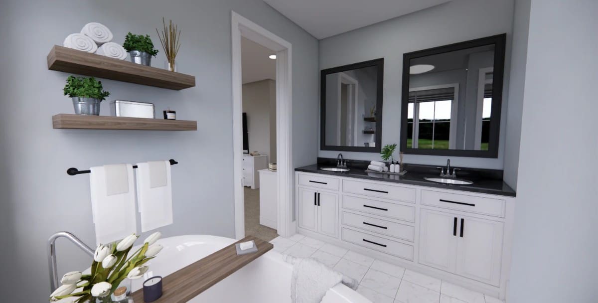 Primary vanity with two sinks, framed mirrors, and white cabinets contrasted by wrought iron hardware.