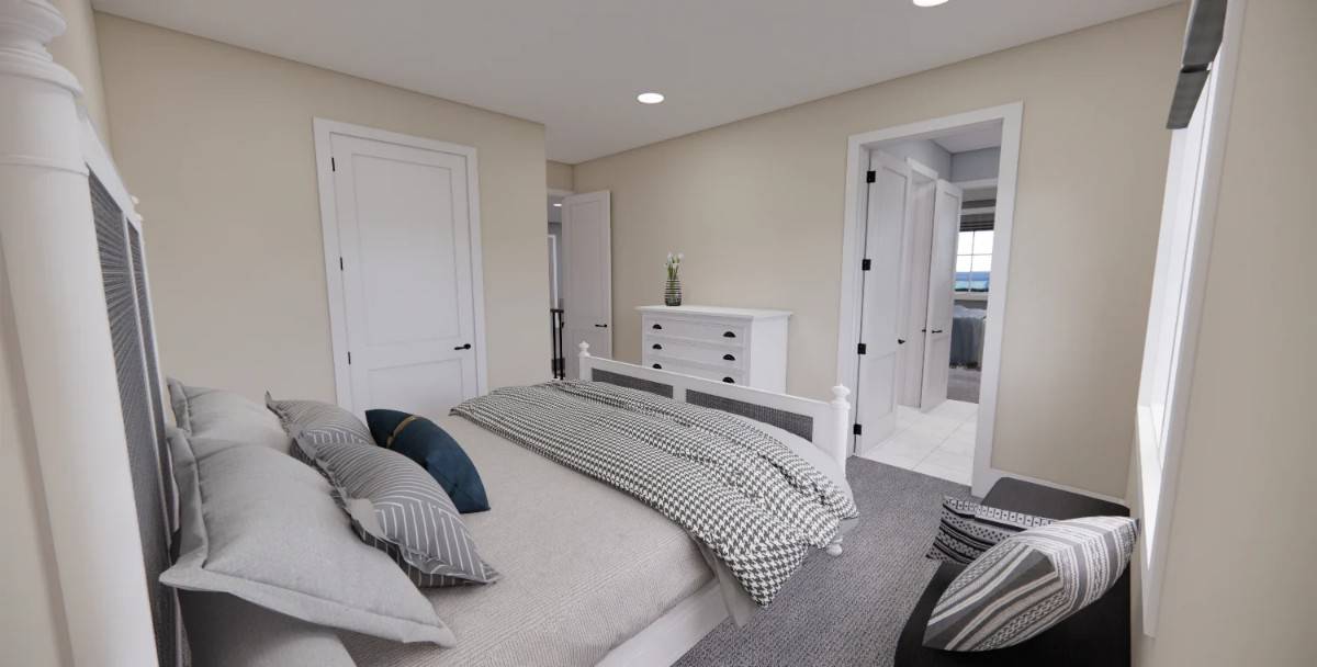Third bedroom with beige walls, a walk-in closet, and full bath access.