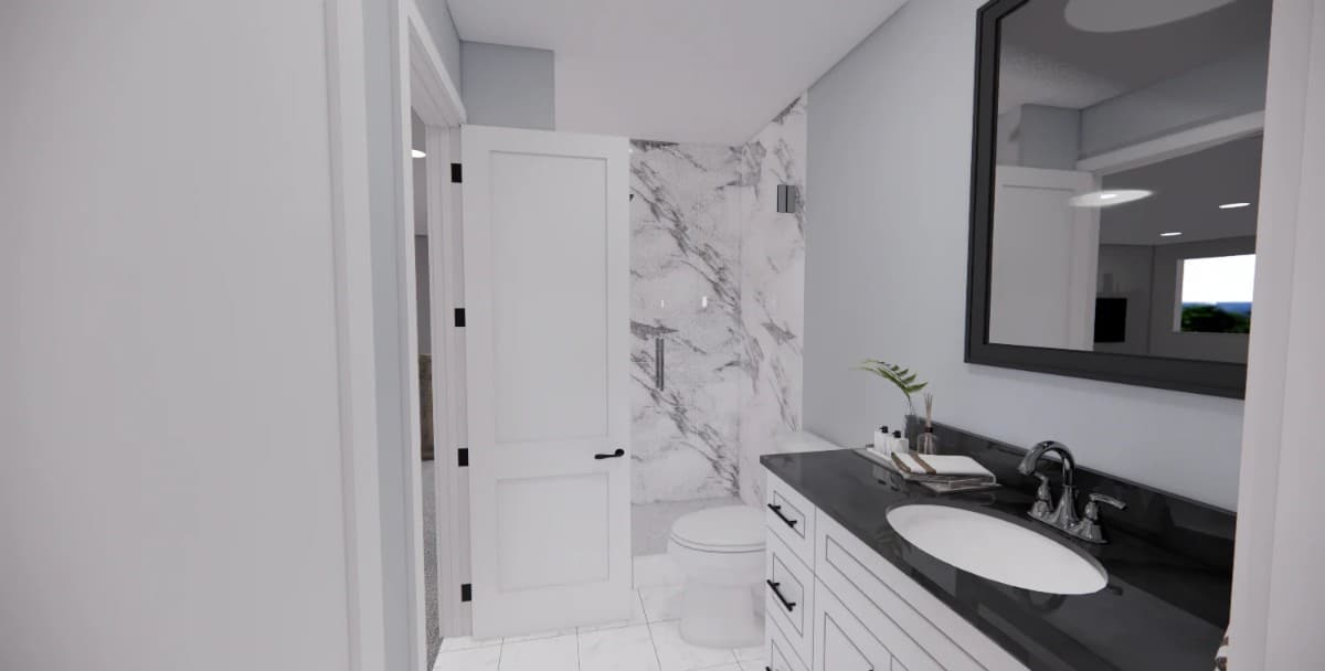 Shared bathroom with a sink vanity, a toilet, and a tub and shower combo.