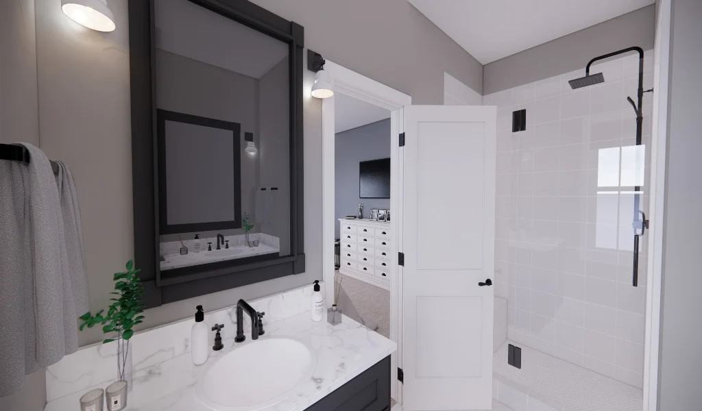 Primary bathroom with dark wood vanities and a tiled shower.