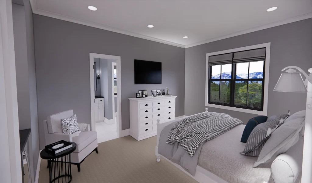 The carpeted primary bedroom has an ensuite bath and a TV mounted above the white dresser.