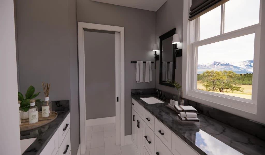Primary bathroom with his and her vanities, and a stunning view of the surrounding landscape.